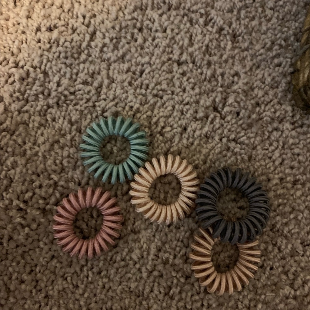 Colorful spiral twisters and bow pony tails